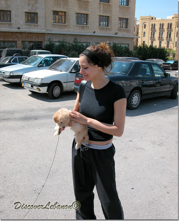 Lebanese Girl holding dog