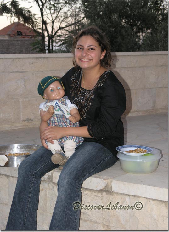Girl holding baby