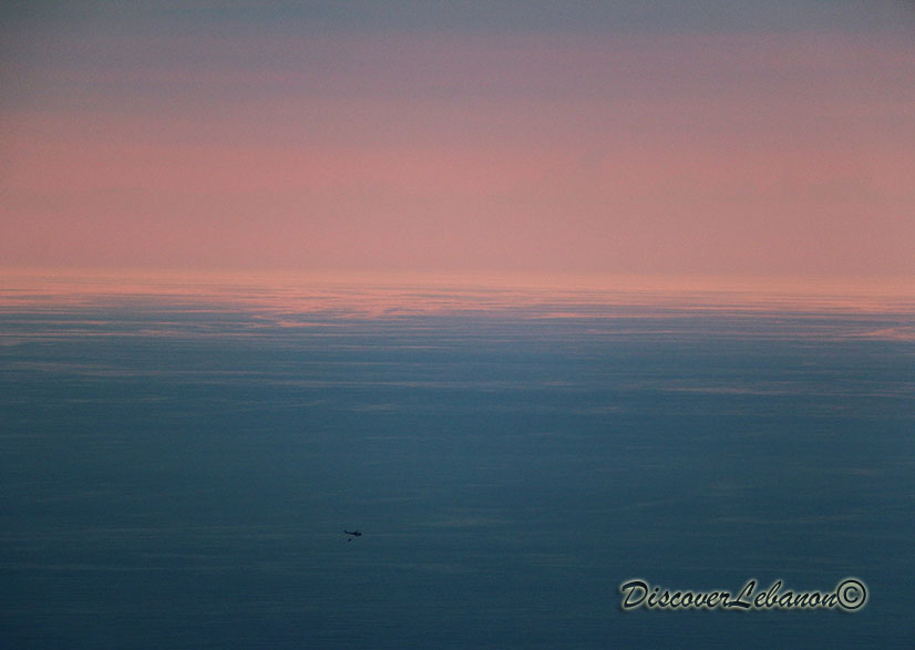 Helicopter sea twilight clouds
