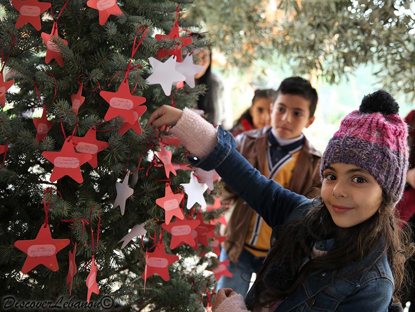 Girl writing wish christmas
