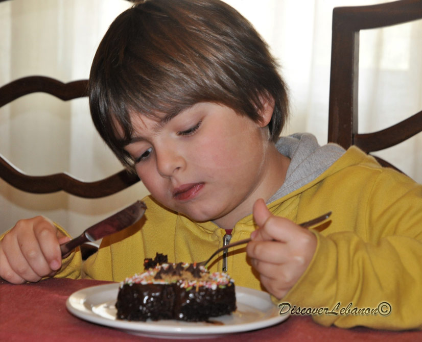 Boy eating cake