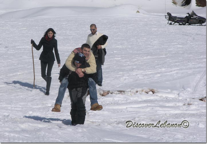Young playing in snow