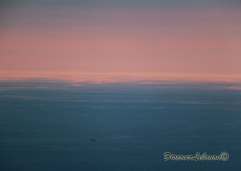 Helicopter sea twilight clouds