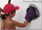 Little girl painting